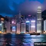 홍콩 역사 - A dynamic urban scene of Hong Kong&rsquo;s skyline at dusk, featuring towering modern skyscrapers with ill...